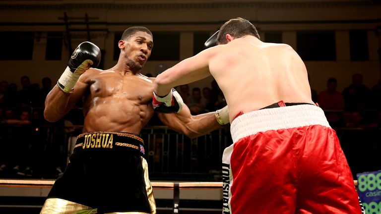 LONDON, ENGLAND - NOVEMBER 14:  Anthony Joshua in action with Hrvoije Kisicek during their Heavyweight bout at York Hall on November 14, 2013 in London, En