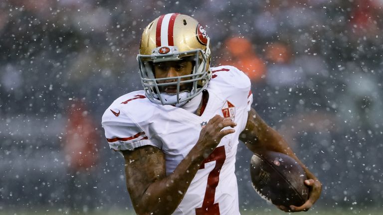 CHICAGO, IL - DECEMBER 04:  Quarterback Colin Kaepernick #7 of the San Francisco 49ers runs with the football in the second quarter against the Chicago Bea