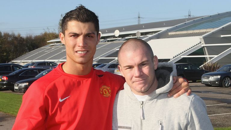 MANCHESTER, ENGLAND - NOVEMBER 6:  Cristiano Ronaldo of Manchester United poses with boxer Jamie Moore