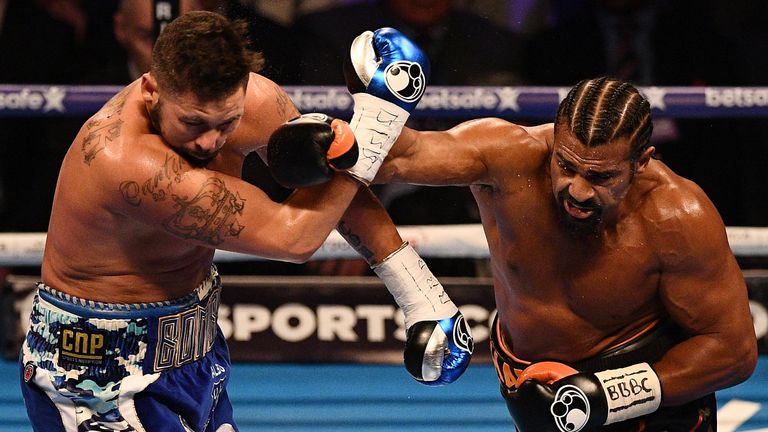 British boxer David Haye (R) unleashes a right cross against compatriot Tony Bellew (L) during their heavyweight boxing match at the O2 Arena in London on 