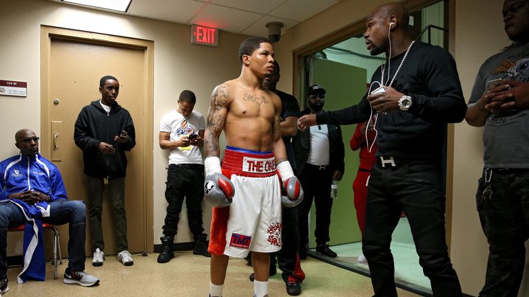 WASHINGTON, DC - APRIL 01: Gervonta Davis talks with Floyd Mayweather (R) back stage before fighting Guillermo Avila of Mexico (not pictured) in their supe