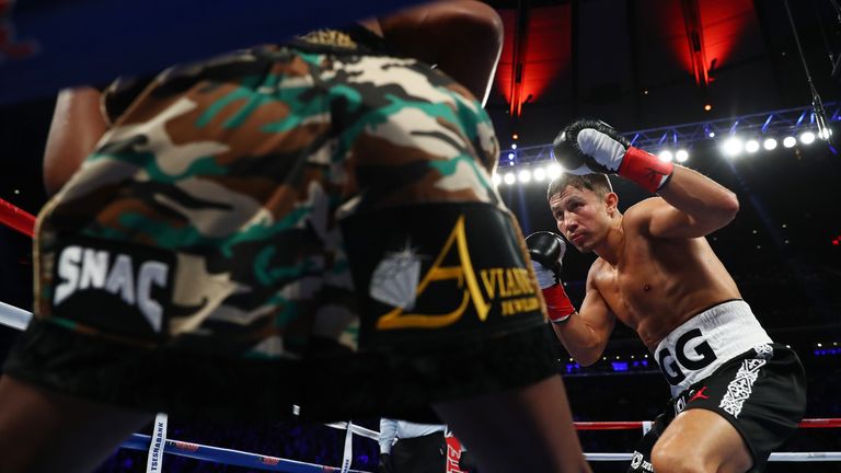 NEW YORK, NY - MARCH 18:  Gennady Golovkin knocks down Daniel Jacobs  in the fourth round during their Championship fight for Golovkin's WBA/WBC/IBF middle