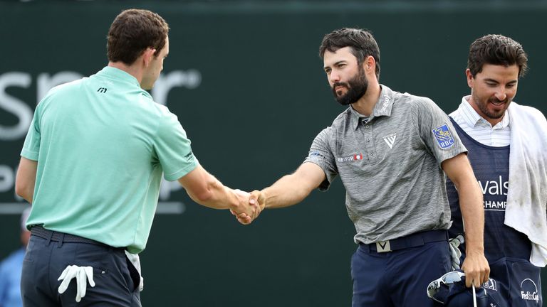 Adam Hadwin is congrtulated by Patrick Cantlay after his one-shot victory