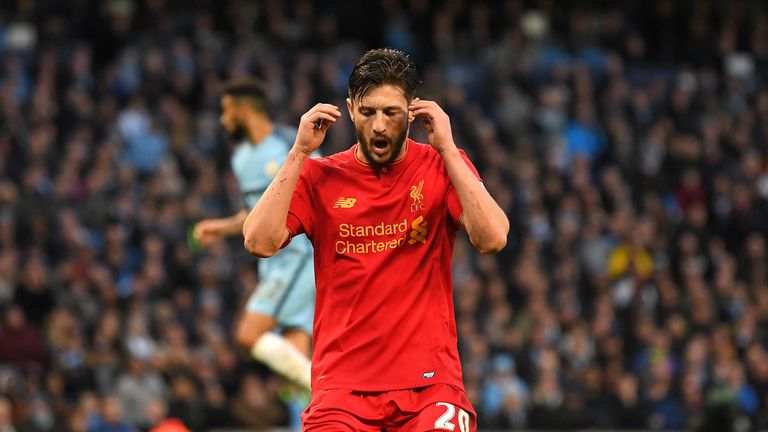 MANCHESTER, ENGLAND - MARCH 19:  Adam Lallana of Liverpool reacts after missing a chance to score during the Premier League match between Manchester City a