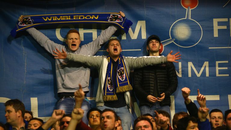 AFC Wimbledon fans sing up ahead of the clash with MK Dons