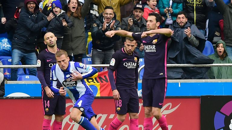 Deportivo La Coruna's midfielder Alex Bergantinos celebrates after scoring during the Spanish league football match RC Deportivo de la Coruna vs FC Barcelo