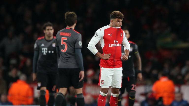 Alex Oxlade-Chamberlain looks dejected after another Champions League humiliation for Arsenal
