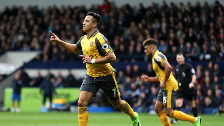 WEST BROMWICH, ENGLAND - MARCH 18: Alexis Sanchez of Arsenal celebrates scoring his sides first goal during the Premier League match between West Bromwich 