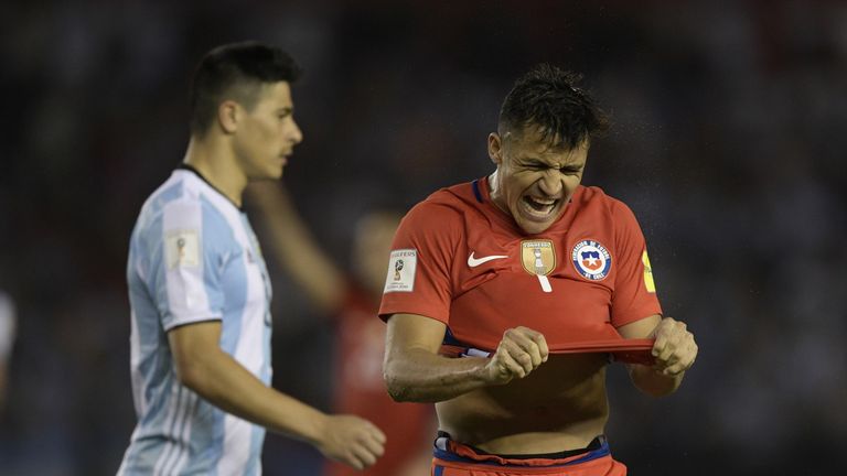 Chile's forward Alexis Sanchez reacts after missing a chance of goal during the 2018 FIFA World Cup qualifier football match against Argentina