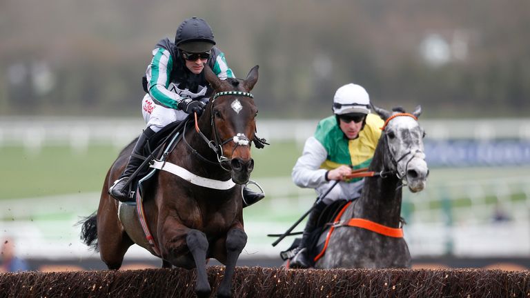 CHELTENHAM, ENGLAND - MARCH 14:  Nico de Boinville ridng Altior (L) clear the last to win The Racing Post Arkle Challenge Trophy Novices Steeple Chase at C