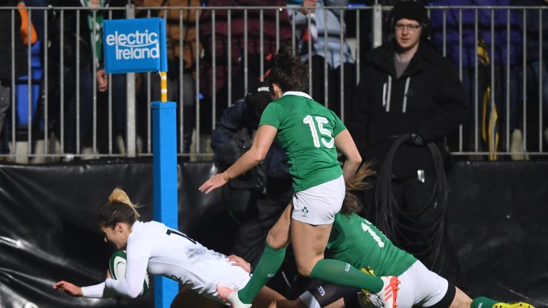 Amy Wilson Hardy of England dives over to score the opening try