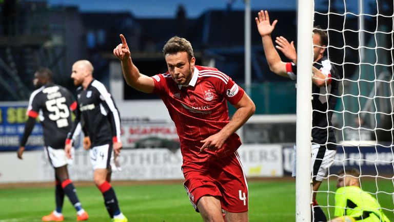 Aberdeen's Andy Considine celebrates after scoring the opening goal.