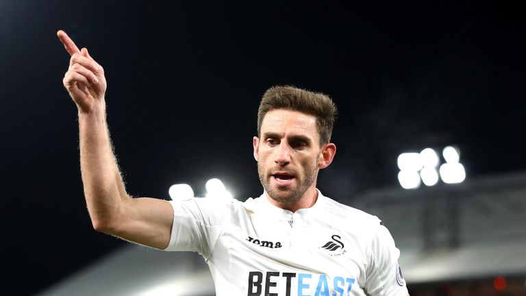 Swansea defender Angel Rangel has broken a metatarsal bone in his right foot 