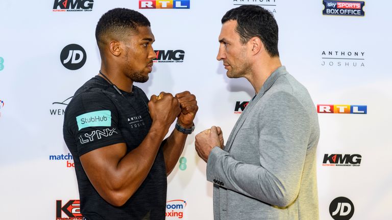 COLOGNE, GERMANY - FEBRUARY 16: Anthony Joshua and Wladimir Klitschko pose at the photocall during the press conference with Anthony Joshua and Wladimir Kl