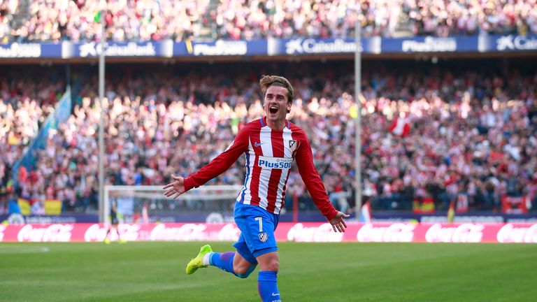 Antoine Griezmann celebrates after scoring a stunning free-kick against Sevilla