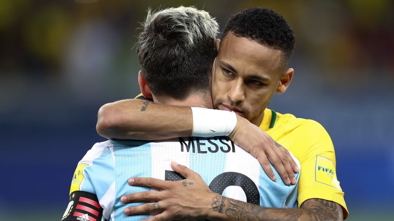 Neymar (R) of Brazil greets Lionel Messi of Argentina during a match between Brazil and Argentina as part of 2018 FIF