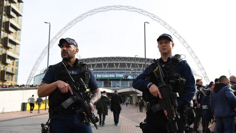 LONDON, ENGLAND - MARCH 26:  Police gather outside the stadium prior to the FIFA 2018 World Cup Qualifier between England and Lithuania at Wembley Stadium 