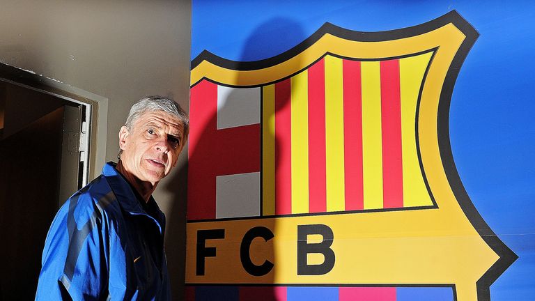 Arsene Wenger arrives for a press conference at the Nou Camp ahead of Arsenal's Champions League tie with Barcelona in 2011