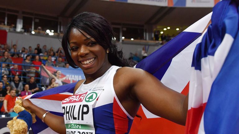 Britain's Asha Philip celebrates after winning the women's 60m final at the 2017 European Athletics Indoor Championships in Belgrade on March 5, 2017. / AF