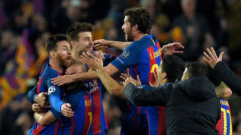 Barcelona players celebrate their victory during the UEFA Champions League round of 16 second leg football match vs Paris Saint-Germain FC