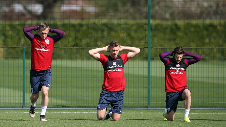 England's (from left to right) James Ward-Prowse, Ben Gibson and Adam Lallana during the training session at Enfield Training Ground, London.