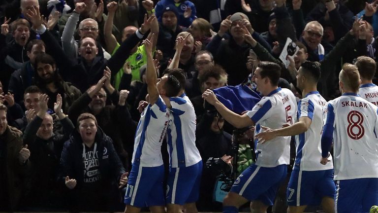 Anthony Knockaet celebrates with team-mates after his early goal against Derby
