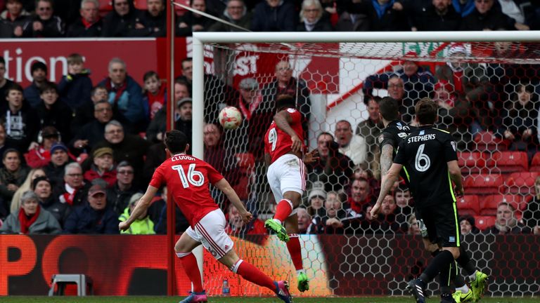 Nottingham Forest's Britt Assombalonga (centre) scores his side's first goal of the game during the Sky Bet Championship match at the City Ground, Nottingh