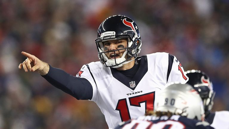 Brock Osweiler shouts instructions at the line of scrimmage in the first half against the New England Patriots