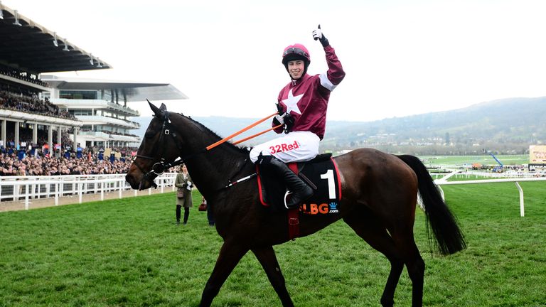 CHELTENHAM, UNITED KINGDOM - MARCH 12: Apple's Jade ridden by Bryan Cooper celebrates after winning the OLBG Mares Hurdle during Champion Day of the Chelte