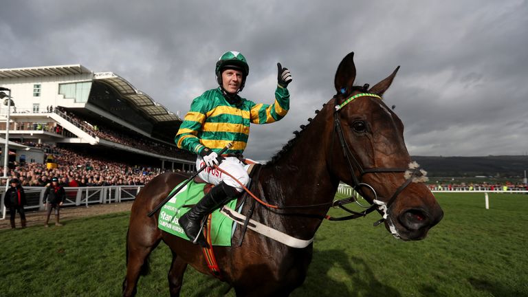 Jockey Noel Fehily on board Buveur D'air celebrates winning the 15:30 Stan James Champion Hurdle Challenge Trophy during Champion Day of the 2017 Cheltenha