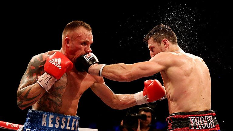 MAY 25:  Carl Froch of England in action with Mikkel Kessler of Denmark during their Super Middleweight Unification bout at the O2 Arena 