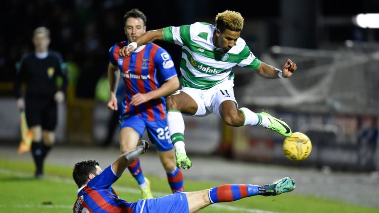 Celtic's Scott Sinclair (right) is tackled by Ross Draper
