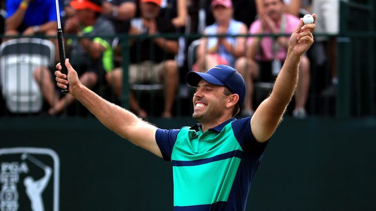 PALM HARBOR, FL - MARCH 13:  Charl Schwartzel of South Africa reacts after a putt on the first playoff hole on the 18th green to win the Valspar Championsh