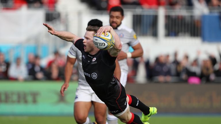 Chris Ashton of Saracens dives over for his second try 