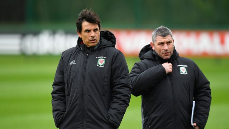 Wales manager Chris Coleman and Osian Roberts (R) look on during an open training session