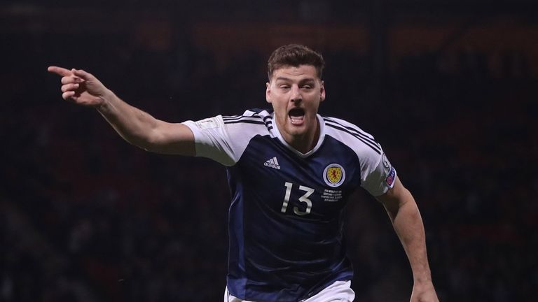 Chris Martin shrugged off jeers to score a crucial goal for Scotland against Slovenia