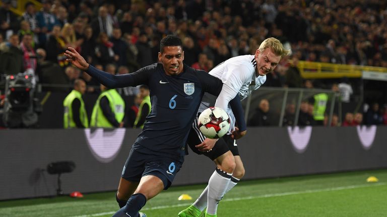 Chris Smalling (left) played against Germany but will be unavailable this weekend