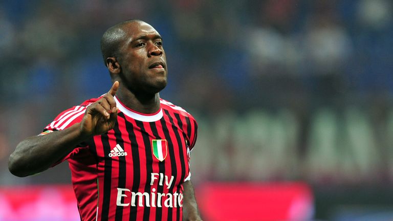 AC Milan's Dutch midfielder Clarence Seedorf celebrates after scoring during the Serie A football match between AC Milan and Cesena at the San Siro Stadium