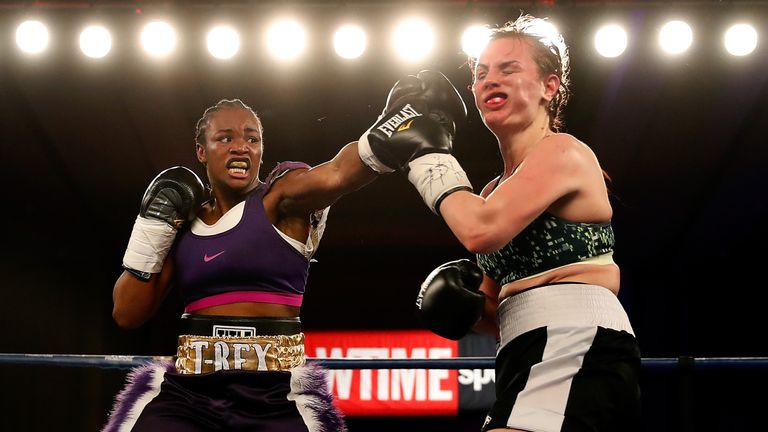 Clarissa Shields lands a punch on Szilvia Szabados of Hungary in the fourth round during the NABF middleweight Championship at the