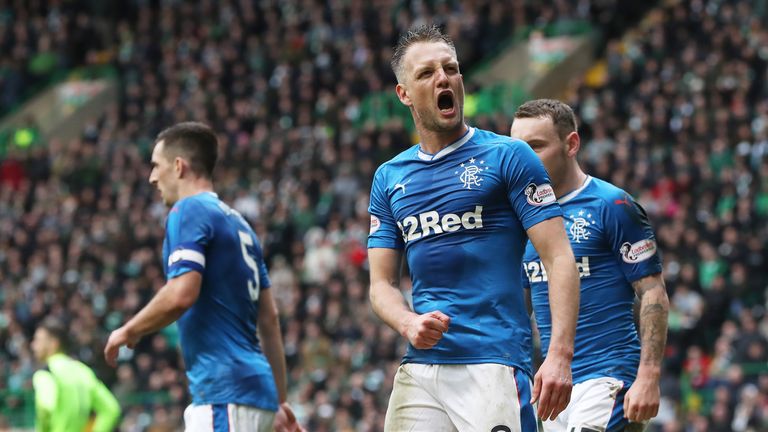 Clint Hill celebrates his late equaliser against Celtic