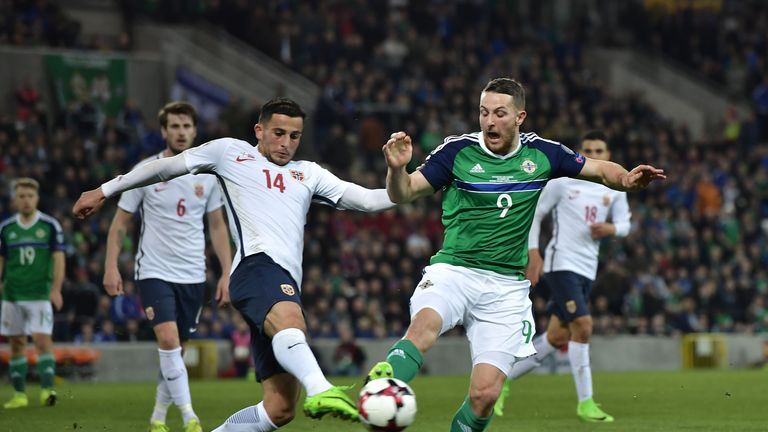 BELFAST, NORTHERN IRELAND - MARCH 26: Conor Washington (R) of Northern Ireland and Omar Elabdellaoui (L) of Norway battle for the ball during the FIFA 2018