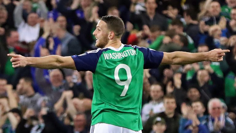 Northern Ireland's forward Conor Washington celebrates after scoring their second goal during the World Cup 2018 qualification football match between North