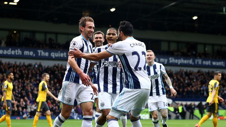 WEST BROMWICH, ENGLAND - MARCH 18: Craig Dawson of West Bromwich Albion (L) celebrates scoring his sides first goal with Nacer Chadli of West Bromwich Albi