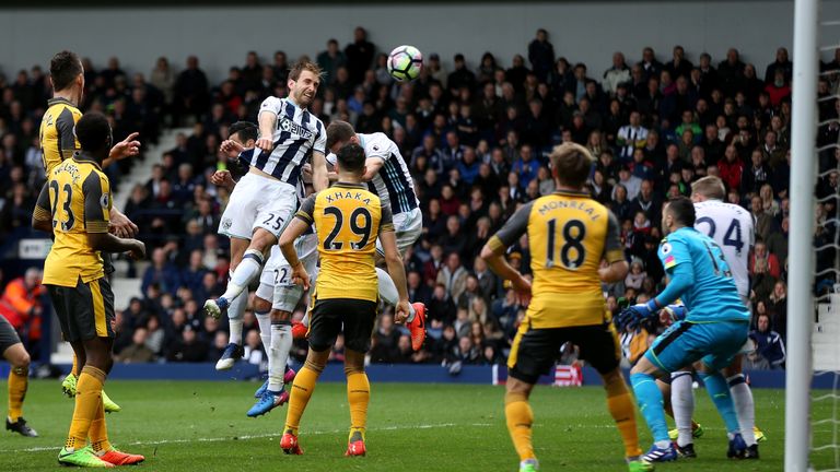 WEST BROMWICH, ENGLAND - MARCH 18: Craig Dawson of West Bromwich Albion (L) scores his sides third goal during the Premier League match between West Bromwi