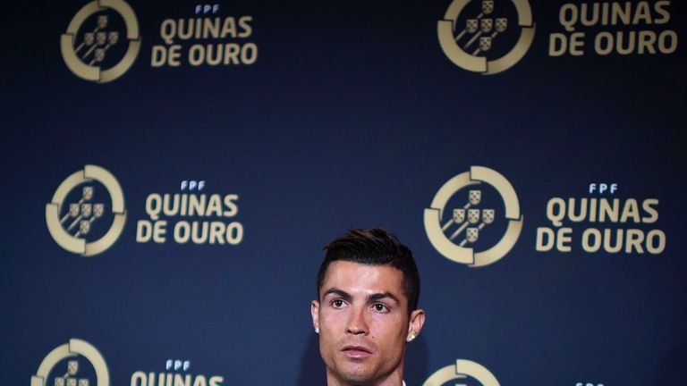 Portugal forward Cristiano Ronaldo poses on arrival at Quinas de Ouro ceremony where he scooped the top award