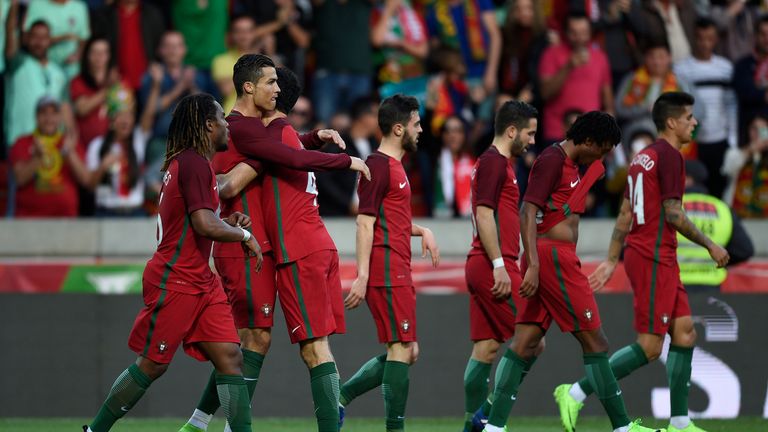 Cristiano Ronaldo celebrates with team-mates after opening the scoring for Portugal against Sweden