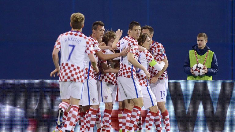 Croatia's players celebrate after scoring a goal during the FIFA World Cup 2018 qualifying football match Croatia vs Ukraine on March 24, 2017 in Zagreb.  
