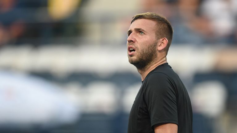 DUBAI, UNITED ARAB EMIRATES - MARCH 01:  Daniel Evans of Great Britain looks on during his second round match against Gael Monfils of France on day four of