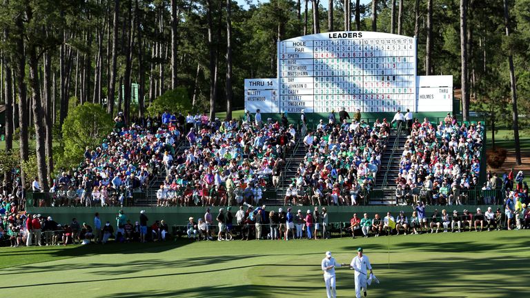 AUGUSTA, GEORGIA - APRIL 10:  Danny Willett of England and caddie Jonathan Smart walk on the 15th hole during the final round of the 2016 Masters Tournamen