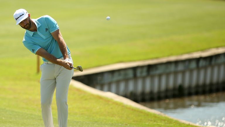 AUSTIN, TX - MARCH 23: Dustin Johnson plays a shot on the 12th hole of his match during round two of the World Golf Championships-Dell Technologies Match P